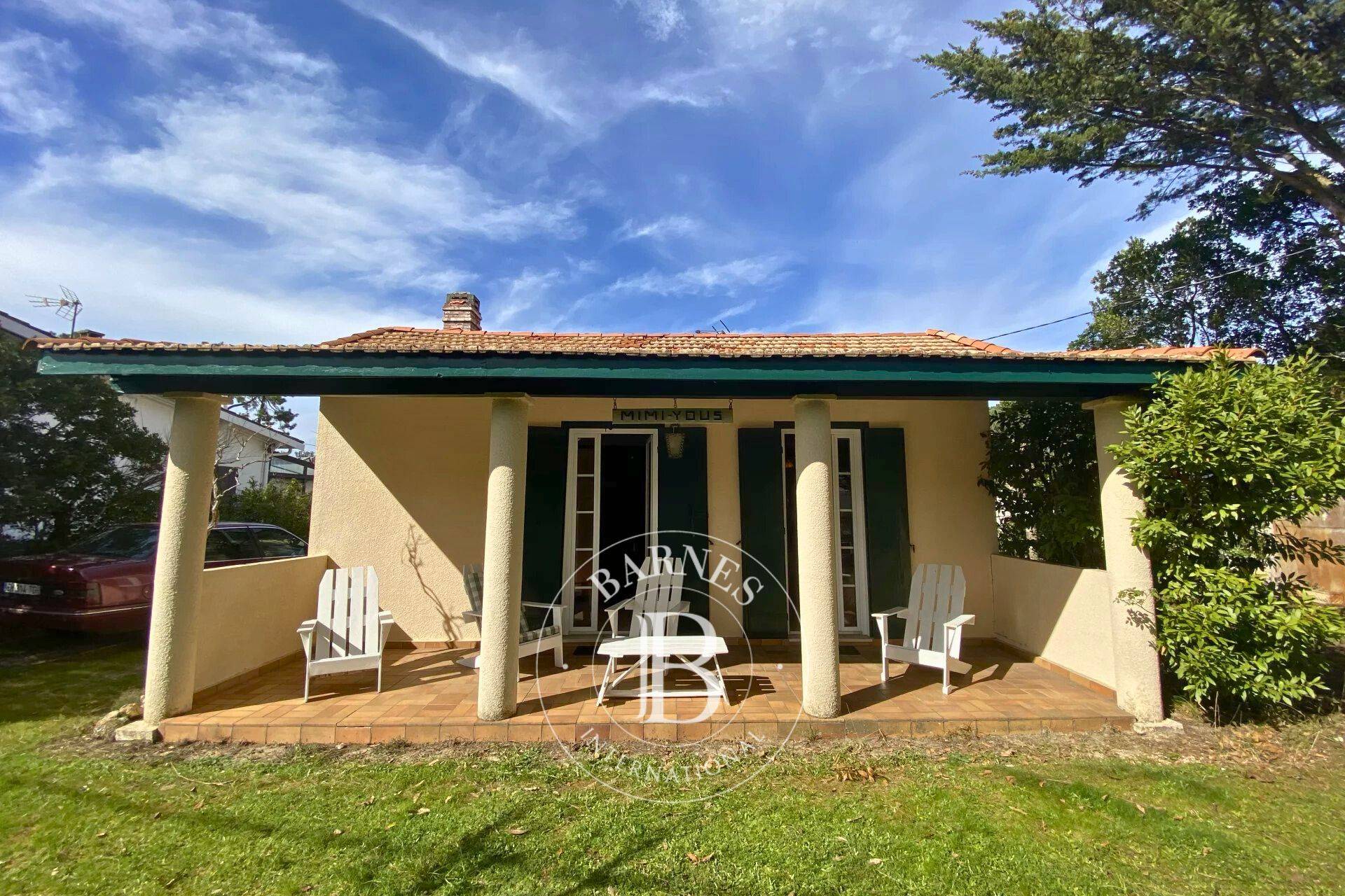 Immobilier de luxe Cap Ferret, villa avec terrasse en bois