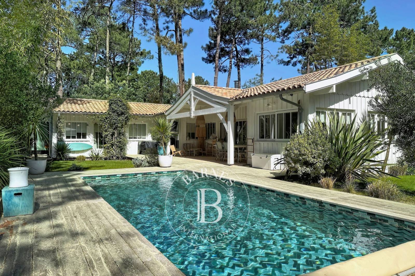 VILLA BOIS PLAIN-PIED AVEC PISCINE CHAUFFÉE ET SOLARIUM, SUR LA PRESQU'ÎLE DU CAP FERRET