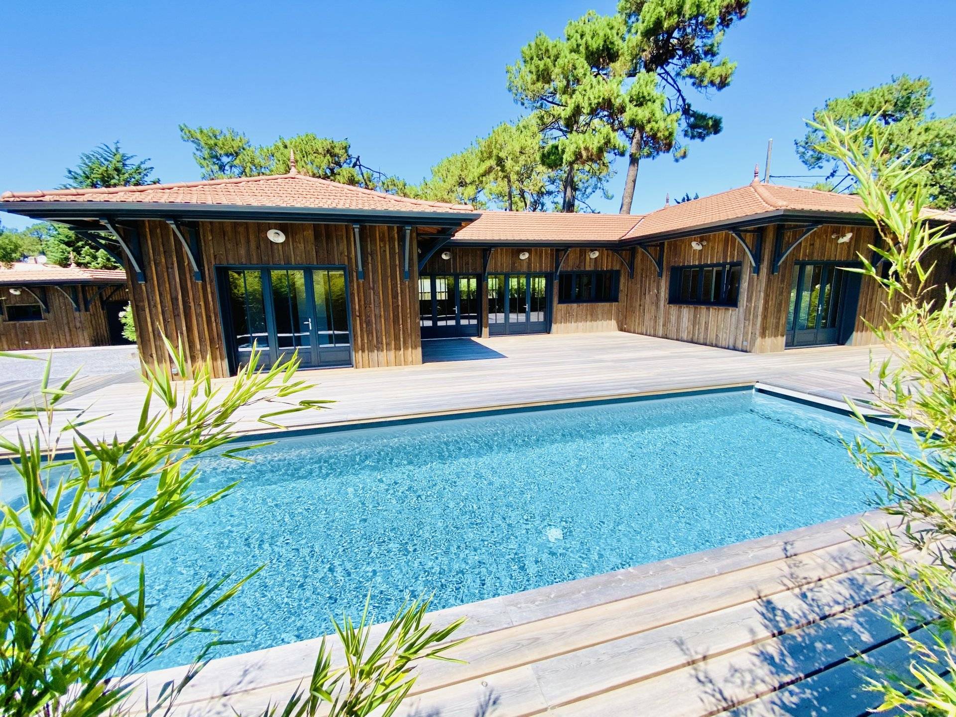 VILLA EN BOIS DE PLAIN PIED A VENDRE PIRAILLAN