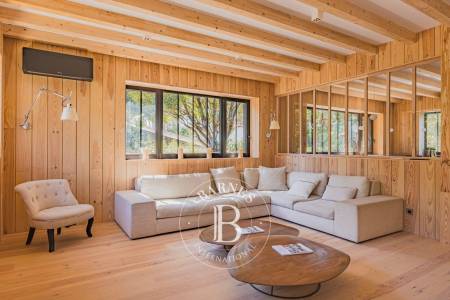 Cuisine moderne avec véranda ouverte sur l’extérieur – Cap Ferret