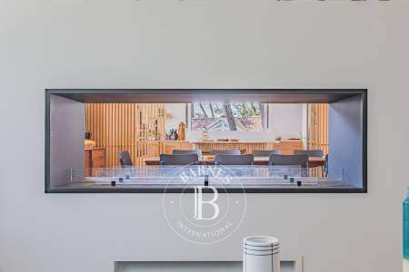 terrasse en bois avec piscine à Piraillan – immobilier de prestige