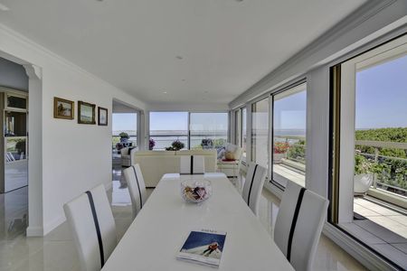 A VENDRE ÉTAGE ÉLEVÉ APPARTEMENT AVEC VUE PANORAMIQUE SUR LE BASSIN D'ARCACHON