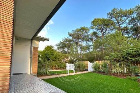 villa Petit Piquey Cap Ferret avec baies vitrées galandage