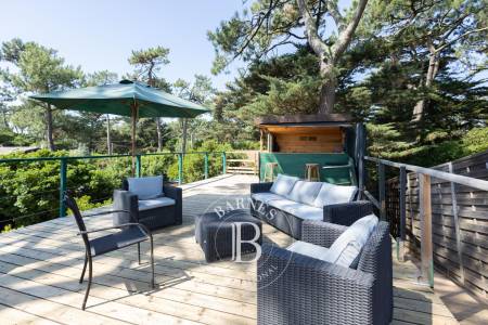 VILLA EN PREMIÈRE LIGNE AVEC VUE PANORAMIQUE SUR LE BASSIN AU CAP FERRET