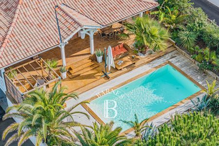 Architecture élégante et décoration balinaise pour cette villa Barnes Arcachon