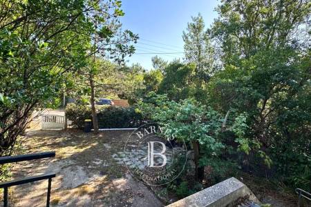 VILLA À RÉNOVER SUR UN TERRAIN EXPOSÉ SUD, AU CŒUR DU CAP FERRET