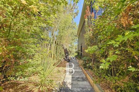 VILLA EN BOIS RÉNOVÉE AVEC PISCINE ET VUE PHARE AU CAP FERRET