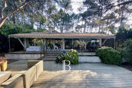 Maison avec grand terrain arboré à Cap Ferret – immobilier de prestige