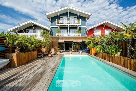 VILLA EN BOIS AVEC PISCINE A VENDRE PORT DE LA TESTE
