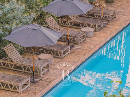 VILLA MODERNE AVEC PISCINE ET GRAND TERRAIN AU CŒUR DU CAP FERRET