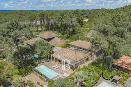 VILLA CONTEMPORAINE EN BOIS AVEC 4 SUITES ET PISCINE CHAUFFÉE DANS LE SECTEUR DES VALLONS DU FERRET