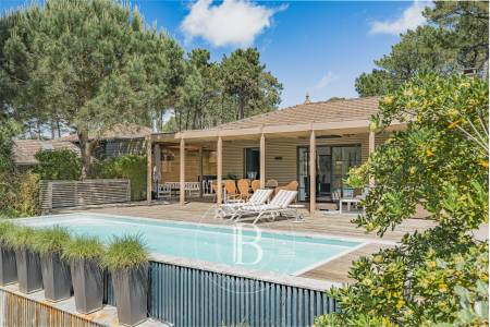 VILLA CONTEMPORAINE EN BOIS AVEC 4 SUITES ET PISCINE CHAUFFÉE DANS LE SECTEUR DES VALLONS DU FERRET