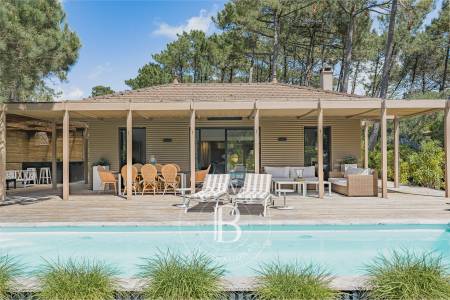 VILLA CONTEMPORAINE EN BOIS AVEC 4 SUITES ET PISCINE CHAUFFÉE DANS LE SECTEUR DES VALLONS DU FERRET