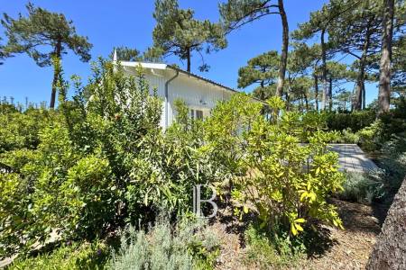 VILLA EN BOIS AVEC PISCINE ET 4 CHAMBRES À PIRAILLAN, SUR LA PRESQU’ÎLE DU CAP FERRET