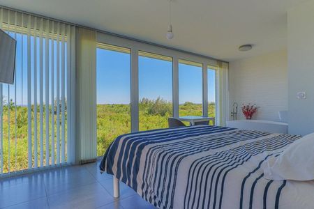 VILLA CONTEMPORAINE SUR PILOTIS AVEC VUE PANORAMIQUE SUR LE BASSIN ARCACHON A VENDRE